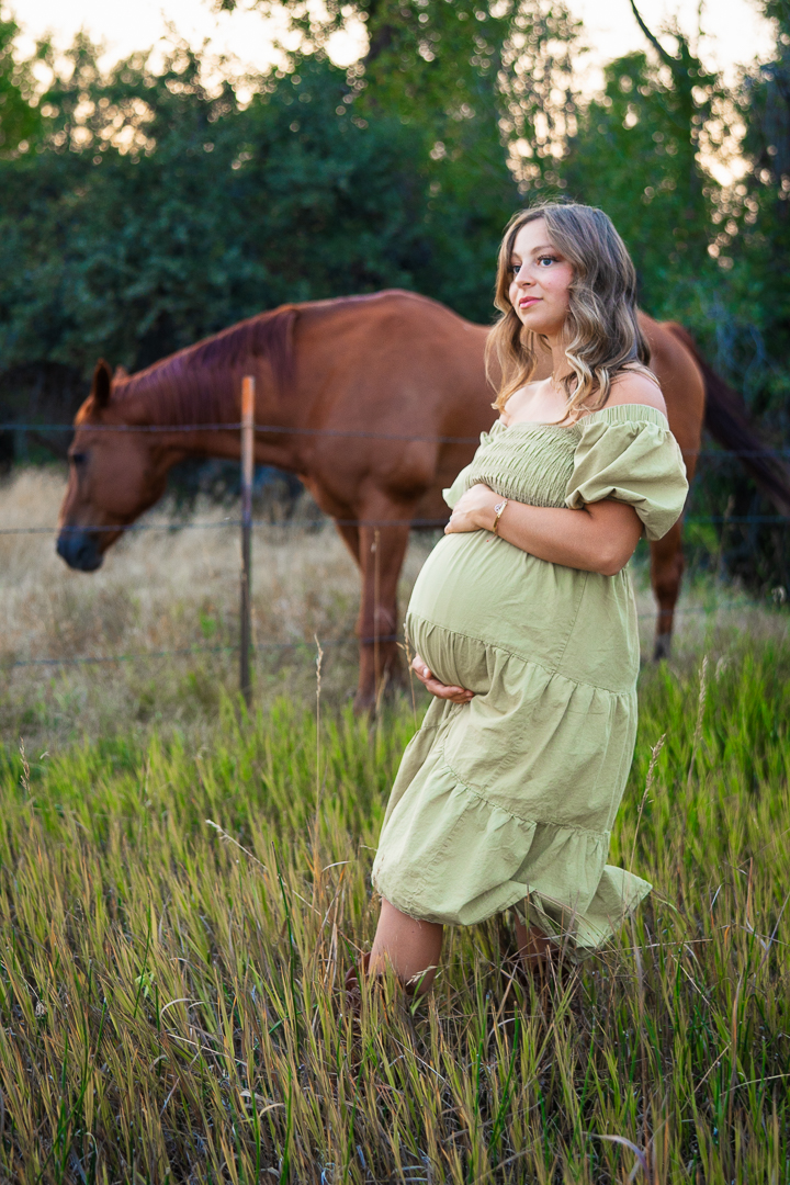 Expecting couple in nature